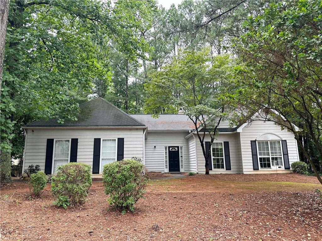 Welcome to this charming 3 bedroom, 2 bathroom home nestled in the heart of Woodstock, Georgia. This property offers the perfect blend of modern updates and timeless appeal. Step inside to discover an open floor plan, creating a spacious and inviting atmosphere for both relaxation and entertaining. Real hardwood floors flow seamlessly throughout, adding warmth and character to every room. The house boasts a well-maintained interior with thoughtful upgrades. Outside, you'll find a cozy and manageable backyard area, ideal for outdoor gatherings or a tranquil retreat. However, the true gem of this home lies in its prime location within the highly desirable part of town. Don't miss this incredible opportunity to experience the best of Woodstock living.