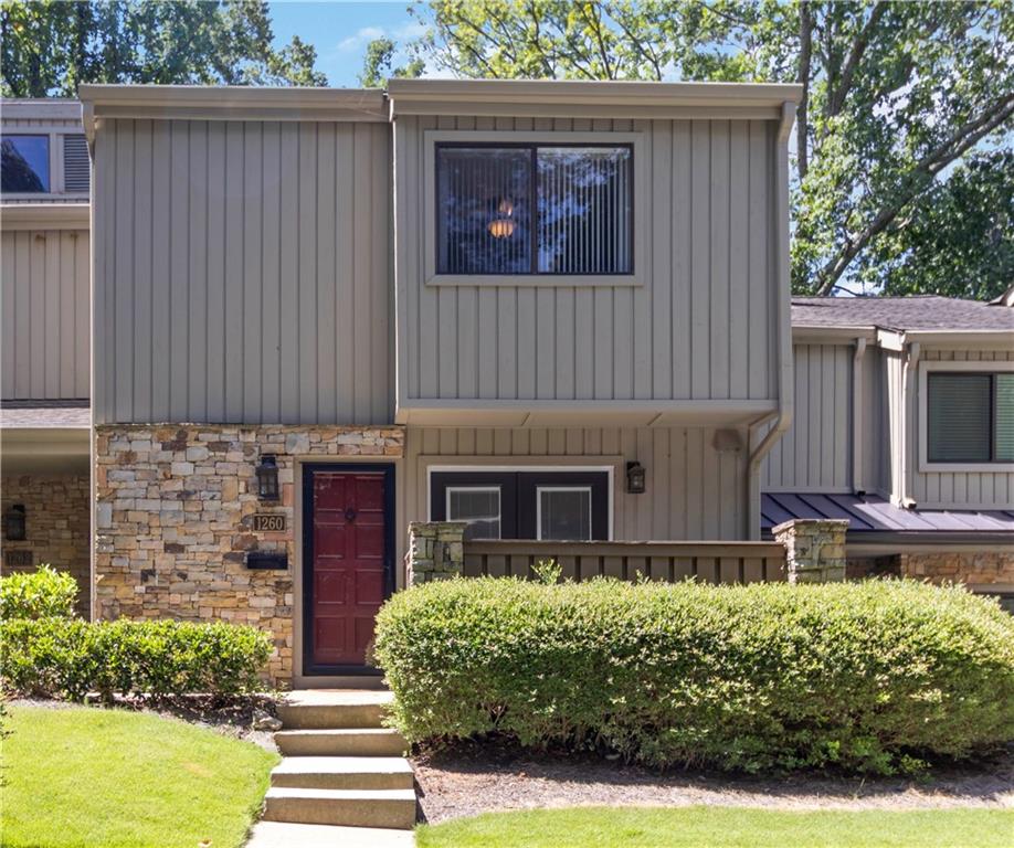 Nestled in the heart of Brookhaven, a stone's throw from the hustle and bustle of Buckhead, you will love the serene peace of your wooded private patio of this updated 2-bedroom, 1.5 bath home. Kitchen has beautiful new flooring, new oven and microwave, and beautiful new French doors to your little patio off the kitchen. Enjoy this open main living area with plenty of space for a large dining table and living room furniture for comfortable living and entertainment. Upstairs, the primary bedroom offers a closet that spans the full width of the bedroom, and a private balcony overlooking the wooded patio below. The second bedroom has a walk-in closet AND an additional storage closet. Plenty of additional closet space in the hall upstairs lends itself to ease of living. The full bathroom upstairs is updated with two separate vanities, tub/shower combo, and a washer/dryer that remains with the property. The 2 deeded parking spaces in front of the condo allow easy access to the main level. Enjoy a short walk to the amenities of pool and clubhouse. In addition to all that Brookhaven has to offer, this quiet, well-managed Druid Knoll Community is the perfect location, within minutes of Buckhead/Lenox/Phipps Plaza to the west, and a quick zip over to I-85/N Druid Hills exit to the east, where you find the new Children's Hospital of Atlanta, Emory Musculoskeletal Institute, and many great shopping and dining options all around. Prime location at a very affordable price!! SPECIAL FINANCING OPTIONS AVAILABLE WITH PREFERRED LENDER.