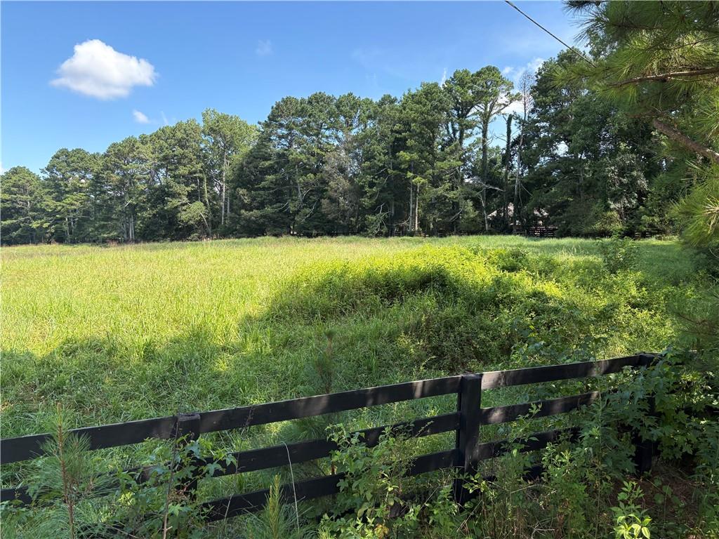A Beautiful Estate Home Lot ,Very Desirable School District. Located in Highly sought after Creekland ,Creekview and Avery School Districts. 20 minutes to these local Cities Alpharetta, Roswell, Cumming, Canton, Ball Ground and Woodstock. Very close to Milton, only a few minutes.