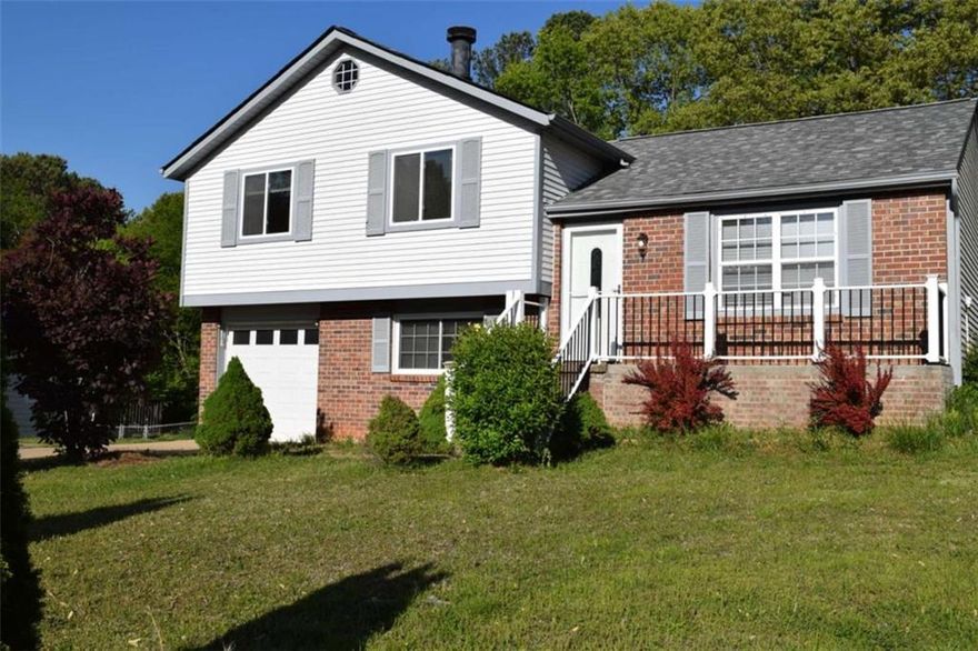This beautifully updated 3-bedroom, 2-bath split level offers a functional and inviting layout in a prime location near HWY 75 and 575, East Cobb, Historic Downtown Marietta and Woodstock, KSU, and top-rated schools with no HOA. The open floor plan features a modern kitchen with granite countertops. A level, fenced-in backyard provides a private outdoor retreat, ideal for play, or relaxation.  Don't miss out on this one!