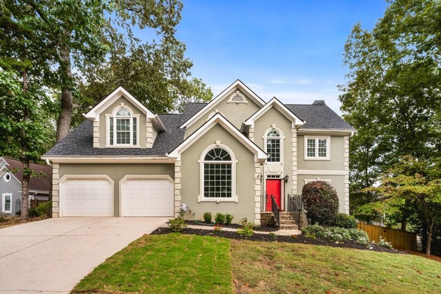 Over $100K in recent upgrades! This beautifully updated home in sought-after Laurel Springs offers modern comfort, style, and lasting value. Recent improvements include a new architectural shingle roof with transferable 50-year warranty, new privacy fence, new irrigation system, remodeled main level with updated flooring, laundry room, half bath, and pantry, custom entertainment center, bay window bench seat, and a remodeled basement bonus room. Outside, enjoy new brick hardscaping with winding paths, a fire pit area, and raised garden beds. Convenient West Cobb location close to Marietta Square, shopping, dining, and top-rated schools. Move-in ready and meticulously maintained schedule your showing today!