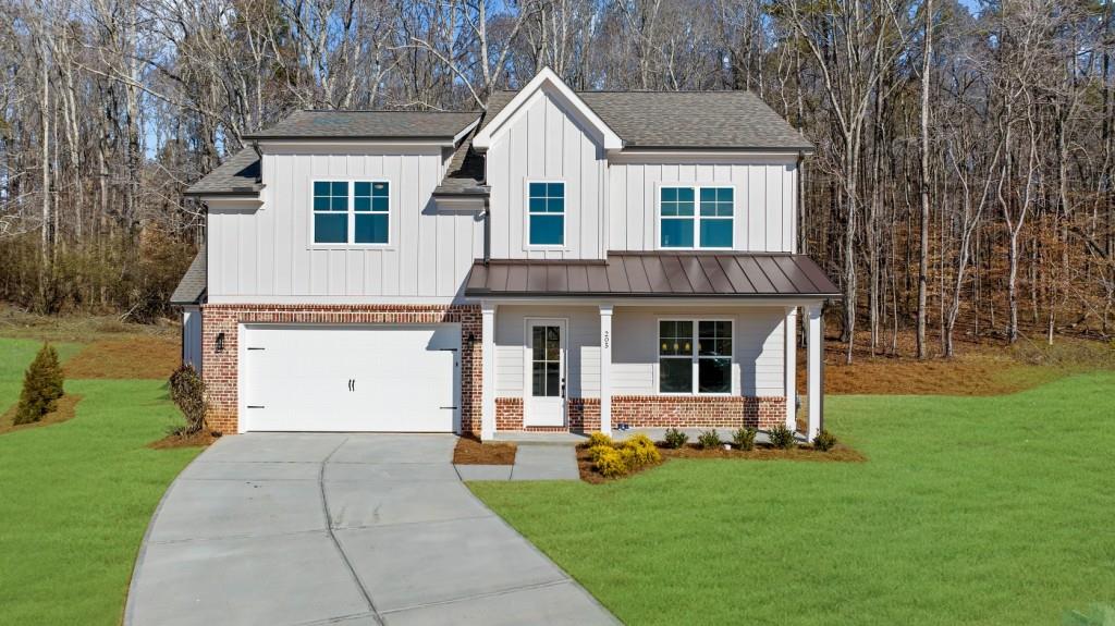 Discover the epitome of luxury living with one of the final three homes available in the coveted Haley Station neighborhood, perfectly situated adjacent to the prestigious Woodmont Golf and Country Club. This stunning new construction residence combines elegance, high-end finishes, and a prime location for an unparalleled living experience. Step inside to find a chef's kitchen that is sure to impress, featuring sleek quartz countertops and a top-tier KitchenAid appliance package perfect for both everyday meals and gourmet entertaining. The open-concept layout seamlessly connects the kitchen to the spacious living and dining areas, creating an inviting space for both relaxation and social gatherings. Set on a private cul-de-sac lot, the home boasts a beautifully landscaped backyard with a covered patio including a cozy fireplace, providing a peaceful retreat for outdoor enjoyment and entertaining. Upstairs, the expansive master suite offers a luxurious escape, complete with a spa-inspired master bath. Enjoy the oversized shower, freestanding soaking tub, and premium finishes that create a serene, relaxing atmosphere. With only a few opportunities left, don't miss your chance to own a truly exceptional home in this prime location, adjacent to all that Woodmont Golf and Country Club has to offer. Schedule a private tour today!