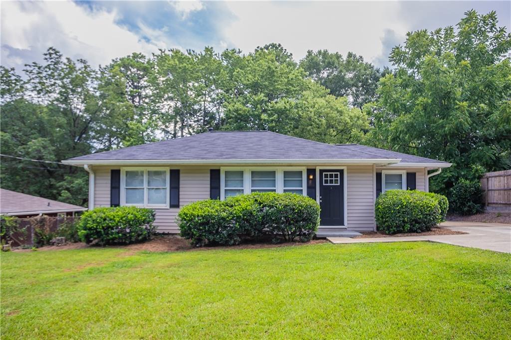 Welcome to this charming single-level ranch home nestled in the Casey Park community of Marietta. Featuring 2 spacious bedrooms and 1 full bathroom, this residence showcases updated flooring, fresh interior paint, and modern stainless steel appliances in a bright, functional kitchen. With its classic hardwoods, off-street parking, and a sizable backyard complemented by a wood deck—this home provides cozy comfort and room to personalize. Ideal for first-time buyers, downsizers, or investors seeking convenience near Windy Hill Road, major highways, and shopping centers.