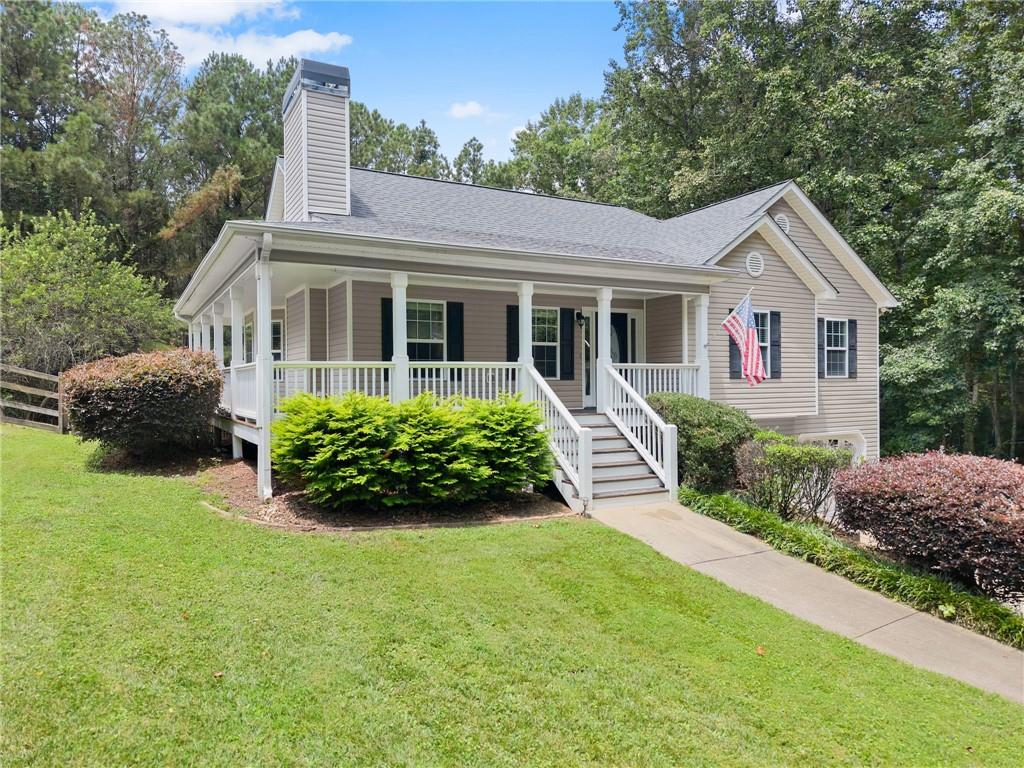 Welcome home to this beautifully updated 3-bedroom, 2-bathroom gem in the charming city of Nelson, GA! Just 5 minutes from historic Downtown Ball Ground and a short stroll to the city park and baseball field, this home offers both convenience and small-town charm. Recent upgrades include new LVP flooring upstairs, new carpet in the partially finished basement, a brand-new 30-year roof, a new HVAC system, and a new water heater. The septic system has been pumped and inspected, air ducts professionally cleaned, and the fireplace swept and certified. Situated on a quiet dead-end street, the property boasts a spacious fenced-in backyard—perfect for pets or play. The primary suite features double vanities, a separate shower, and a relaxing whirlpool tub. The basement is stubbed for a bathroom and ready for your finishing touches. No HOA and zoned for the Creekview school district. Owner/Agent.