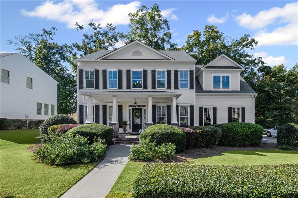 Fabulous Home with great Curb Appeal and Excellent Forsyth Schools! Fantastic Subdivision with wonderful amenities and a very active swim/tennis community! This quality built home features granite countertops, stainless appliances, double oven and hardwoods on the main level. The interior of the home has just been painted a nice warm neutral color. Large master suite with sitting area & spa bath. All of the secondary bedrooms are nice sized. Full finished daylight terrace level. Side entry garage. The home is super clean and move in ready.