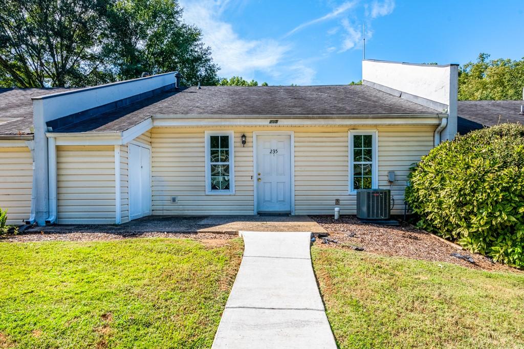 Charming Downtown Woodstock Townhome - Perfect Location!!  Welcome to this move in ready gem in the heart of Downtown Woodstock!!  Just a short walk or golf cart ride away from all the shopping, restaurants, dog park and nightlife that make this area so desirable.   3-bedroom 2 bath backs up to the community pool, providing easy access for summer fun and relaxation.  Enjoy the peaceful view from your spacious sunroom or step onto the back deck for outdoor dining and entertaining.  Inside you'll find an open concept living space with large windows from the sunroom that bring in plenty of natural light.  Whether you're looking for an amazing rental or the perfect place to call home, this unit offers endless possibilities.  Ready for immediate occupancy or update to suite your unique style.  Enjoy convenience, comfort and all the excitement Woodstock has to offer right at your doorstep!!  Don't miss this fantastic opportunity!!  Schedule you're showing today!!