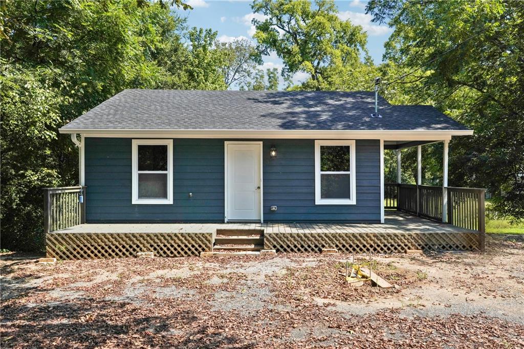 Cute, renovated ranch home for sale in a great Rome location. This home offers an updated kitchen with new white cabinets, new granite countertops, all ne stainless appliances, and a great backsplash. The house also has a totally new bathroom with tile floors and a large tile shower. The home comes with new paint, new hardwood floors, new windows, new HVAC system, and a new water heater. The exterior of the house has a great front porch, off street parking pad/driveway, new siding, new roof, large crawlspace for storage, and a nice backyard. Home is near shopping and The Silver Comet Trail. Must See!!