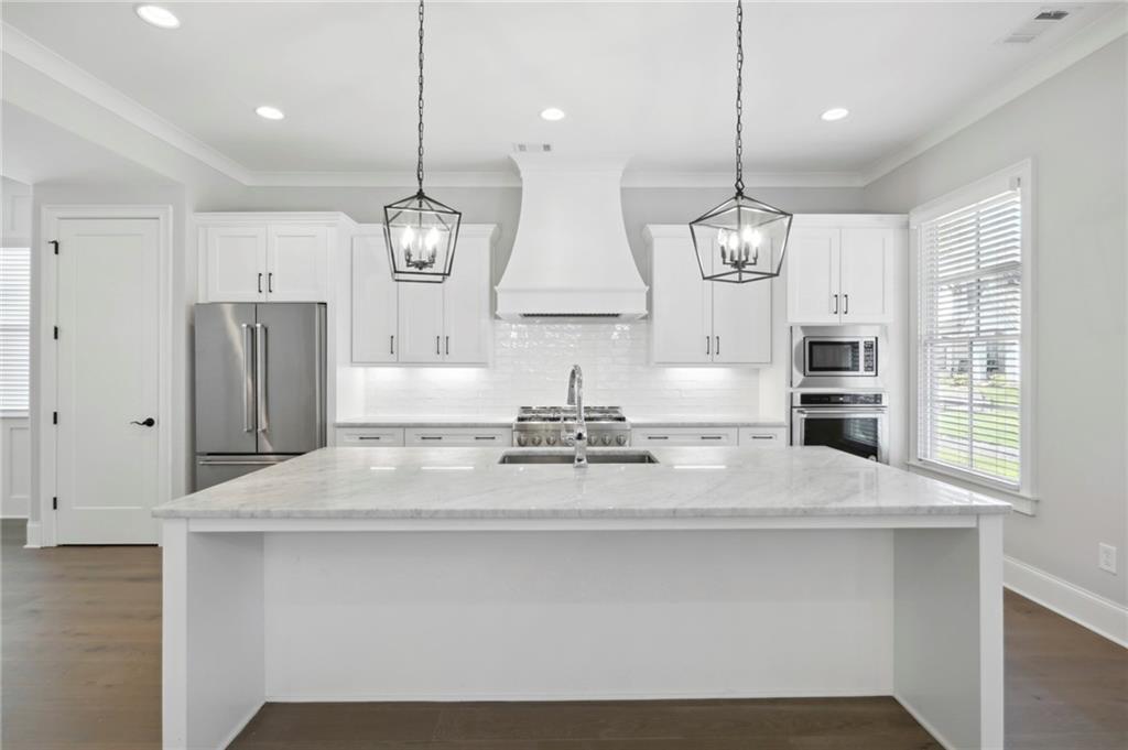 A rare opportunity to rent in this small community of 26 homes. This is one of Brookhaven's most unique community designed around its courtyard which amenities include walking paths, fire pits, communal gardens, pergola with benches and water feature. Enjoy the benefits of a single family home without the yard work. A beautiful almost new four bedroom, three and half bath home plus a bonus room on top floor. Bonus Room is great for a media room, home office or second entertaining room etc.. Elegantly designed kitchen with marble countertops, custom white cabinets with soft close drawers, huge island, single sink, six burner range, built-in oven and microwave. Main level features an open floorpan with views to family room, kitchen and dining room. Over-sized master with spa like bathroom featuring herringbone tiles, free standing tub, double vanity and spacious shower. Laundry room is upstairs with washer and dryer. Fenced backyard. Home is located just minutes to Children's Healthcare of Atlanta, Emory, Chamblee, Sandy Springs, Dunwoody and Buckhead. Easy highway access I85 & GA 285. No roommates.