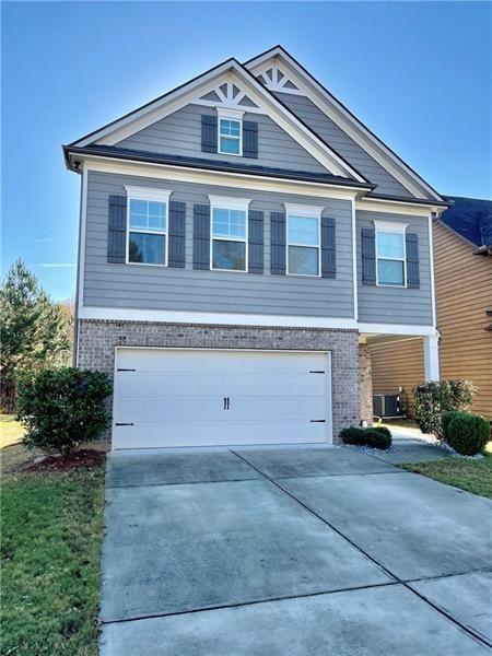 Located in heart of Braselton City. Level driveway. Covered porch in back. Kitchen opens to family room. Tons of window in family room & dining area, oversized master located upstairs. Tiled flooring in Master bathroom. Separate shower and tub. Upstairs three spacious secondary bedrooms and laundry room. Community offers swimming pool, tennis court and fitness center. Move in ready. Come and see it.