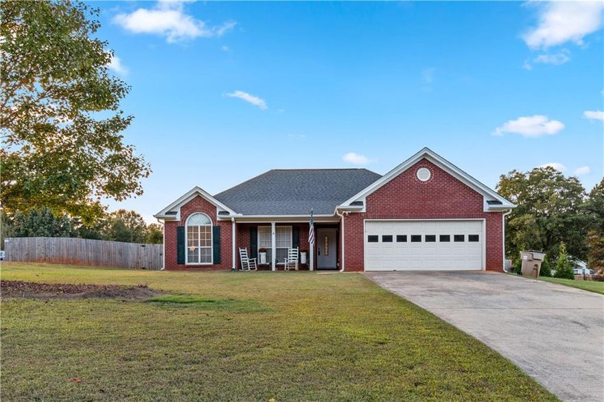 Welcome to 1016 Easy Street in charming Winder! This delightful home offers a perfect blend of comfort and convenience. Nestled on a large, level lot, the property features a spacious fenced backyard, perfect for outdoor activities and relaxation. Inside, you'll find an open floor plan that creates a seamless flow between living spaces, complemented by vaulted ceilings that add a touch of elegance. The home also boasts walk-in closets for ample storage and a large covered patio, perfect for entertaining or enjoying peaceful evenings outdoors. Don't miss the chance to own this beautiful retreat in a friendly community!