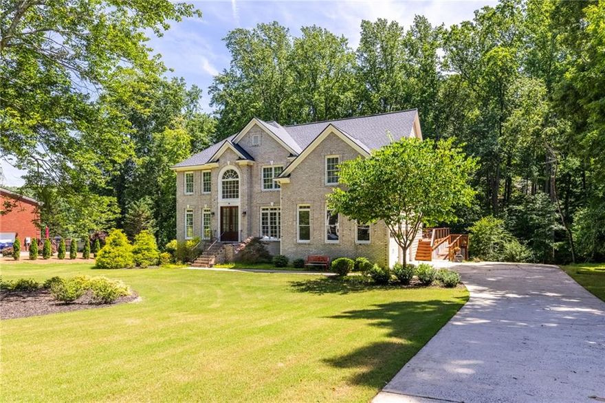 Welcome to 85 Arabian Avenue, a beautifully updated home on a private, wooded 1.02-acre lot in the sought-after Oxford Lake swim/tennis community.
85 Arabian Avenue is a rare opportunity to own a meticulously maintained home in one of Alpharetta’s most desirable communities. This spacious residence offers the perfect blend of elegance, comfort, and functionality with every major system already updated—and ready for you to move in and make your own. Located in a family-friendly neighborhood with resort-style amenities, this home is zoned for Crabapple Crossing ES, Northwestern MS, and Milton HS, and just minutes from Downtown Crabapple, Alpharetta, and Roswell.

85 Arabian Avenue is a rare opportunity to own a meticulously maintained home in one of Alpharetta’s most desirable communities.

Main Level – Open-concept design with a dramatic two-story foyer and family room featuring a fireplace. The renovated kitchen boasts white cabinetry and an eat-in area, seamlessly flowing into the formal dining and living rooms—perfect for entertaining. A rare handicap-accessible guest suite with full bath and ramp access adds convenience.

Upstairs – The oversized primary suite includes a spa-like bathroom with a jetted tub, large walk-in shower, and double vanity. Three additional bedrooms include a Jack-and-Jill bath and a private en suite.

Terrace Level – Finished with a kitchenette, full bath, and flexible living space ideal for a media room, in-law suite, or home office.

Outdoor Living – Enjoy the expansive deck and screened-in porch overlooking a serene backyard with a creek, walking trail, and footbridge.

Recent Upgrades (2024–2025)

New roof, 2 HVAC systems & water heater (Feb 2025)

New attic insulation & interior paint (Mar 2025)

New carpet (Aug 2024)

Additional features include updated bathrooms, Hardi plank siding, newer garage doors (2021), and a programmable irrigation system.