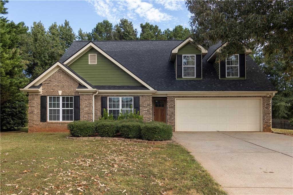 Welcome to this beautifully maintained 4-bedroom, 3.5-bath ranch-style home, perfectly situated on a generous 0.72-acre lot. Offering the ease of single-level living with plenty of room to spread out, this home features a bright, open floor plan ideal for both everyday living and entertaining. Enjoy an eat in kitchen with ample cabinet space, a cozy family room with fireplace. The spacious primary suite includes a private bath and walk-in closet, while two additional bedrooms provide plenty of flexibility for guests, home office, or hobbies on the main level. The bonus room offers a full bathroom. Step outside to a peaceful backyard retreat-perfect for gatherings, gardening, or simply relaxing in the open air. With a screened in porch off the kitchen. Additional highlights include a 2-car garage, main-level laundry off main suite and has access from the hallway. Conveniently located near local schools, shopping, and commuter routes-this one checks all the boxes!