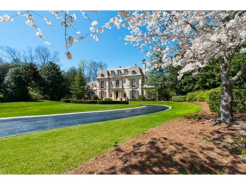 Stunning estate property with more speciality details than can possibly be described. Located in the prestigious Tuxedo Park neighborhood of Buckhead on a quiet cul de sac, this home has it all in its four finished levels. Elevator, Crestron, 4 car garage, private back yard with gorgeous pool and covered loggia, high ceilings, state of the art kitchen and baths, gorgeous lighting and drapes, 4000 bottle wine cellar, theater room, full gym, billiard room, master on main. Magnificently landscaped. This property is truly amazing, beautifully maintained, and a great value!