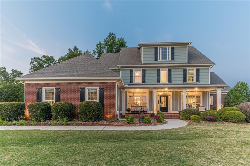 Beautiful 7 Bedroom 4.5 Bathroom Recently Renovated Home with a Large Unfinished Basement Located in Sought After Sharon Elementary and Loganville High Schools. This home has too many upgrades to list. Chef kitchen is freshly remodeled with new cabinets, new eat at kitchen island, new appliances, and granite counters. The kitchen opens to the 2 story family room. The main floor includes a separate dining room, office, mud room, laundry room, master suite, and a guest suite. The master suite has a tray ceiling, large walk in closet, dual vanity, separate tub, & walk in shower. Upstairs has 5 bedrooms, a loft, & 2 bathrooms with one bathroom being a Jack & Jill bathroom. These secondary bedrooms are larger than what you find in most homes. The basement gives you so much storage and a perfect space for future growth for multigenerational use including an in-law suite. 3 Car Garage. The basement already has heating and air. Other recent updates include hardwoods refinished, new carpet, new paint, & more. Upgrades include a whole house water filtration system, a new 3 zone HVAC system for the main floor & basement, whole house sound system, spray foam in the attic, & more. You will want to see this one fast. Come make this your dream home!