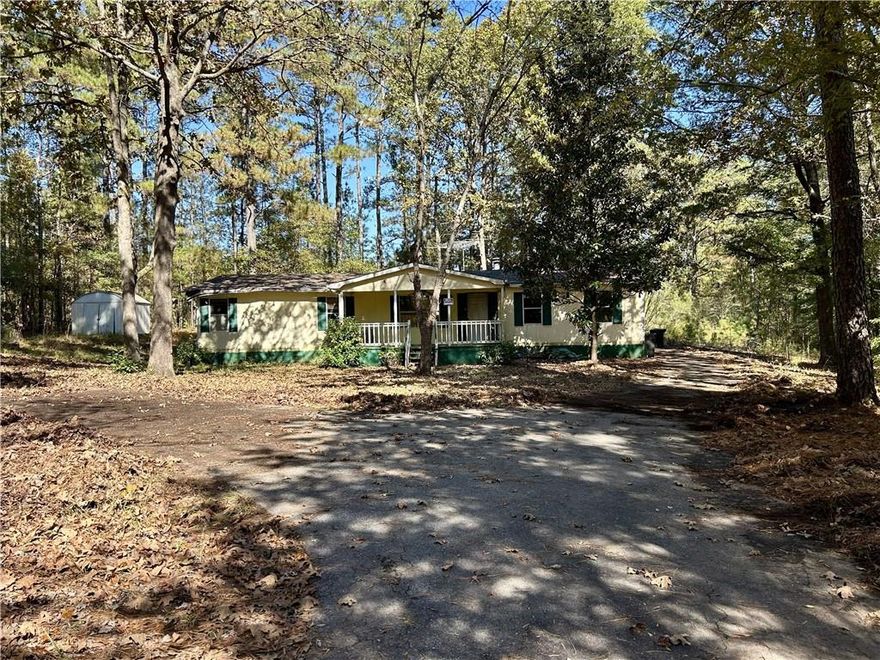 Find peace, privacy, and potential with this 1,620 sq ft, 5 bed, 3 bath home on almost 2 acres in Covington.  Surrounded by mature trees and open space, it's the perfect setting for a quiet country lifestyle or your next renovation project. The home has been partially demoed and is ready for your custom vision.  Located less than 20 minutes from downtown Covington, it offers the best of rural living while still within reach of town conveniences.  This home is eligible for USDA 0% down financing and may also qualify for FHA 203(k) renovation financing.  This is a great opportunity to create your own retreat or investment in a peaceful setting.  Property is in as-is condition with unfinished areas.  Please watch your step and enter with care.  No sign.