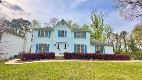 Photo of 4083 Rivermeade Drive SW, Lilburn, GA 30047 (MLS # 7611030)
