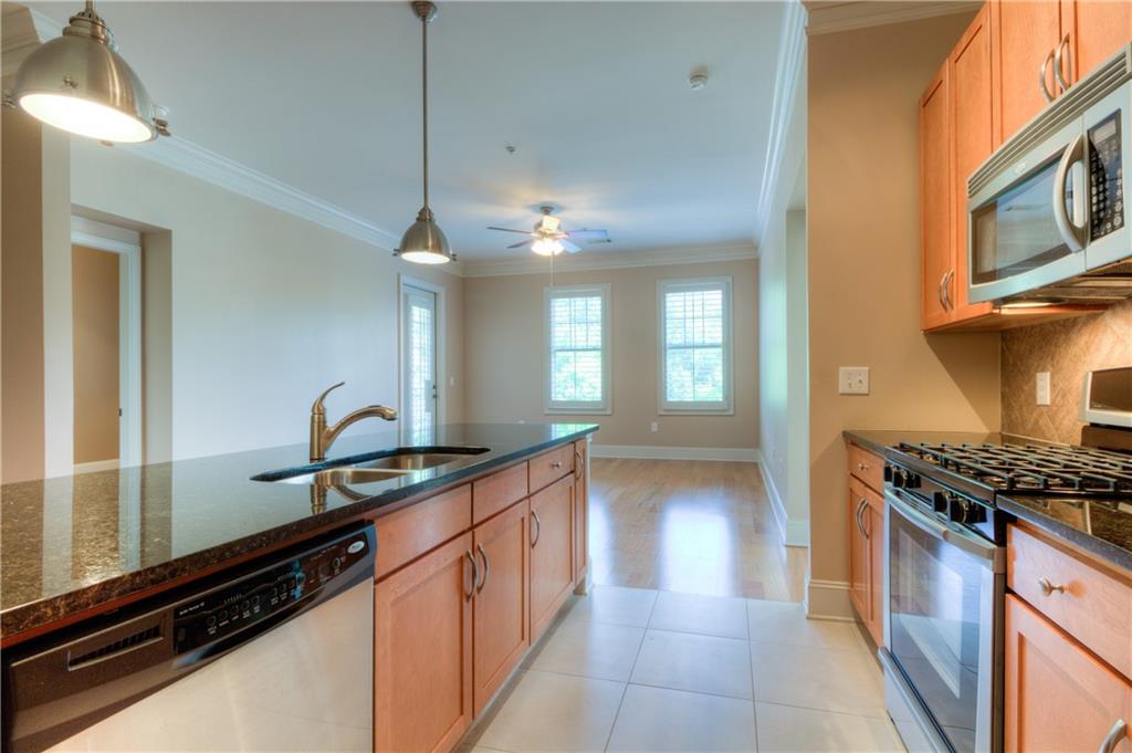 One of a kind TOP FLOOR end unit in a most desirable complex The Residences at Vinings Main. No one above or on either side of this home. Bright natural light with 10ft ceilings throughout. Owners Suite has double vanities, separate soaking tub and glass shower and excellent storage and walk-in closet. Second bedroom with ensuite bath with extra large shower plus linen closet. Kitchen overlooks living room. Located close to elevator and the two easily accessible side by side flat corner parking spaces. Additional convenient parking options. New HVAC unit in 2017, upgraded lighting, ceiling fans, programmable thermostat. Plantation shutters throughout. Be sure to visit the great amenities in the complex. Convenient to dozens of restaurants in Vinings Jubilee, the Battery Entertainment Complex with Atlanta Braves Baseball, and nearby Cobb Energy Centre. This is a unique opportunity, easily walkable, in the heart of Historic Vinings Village.