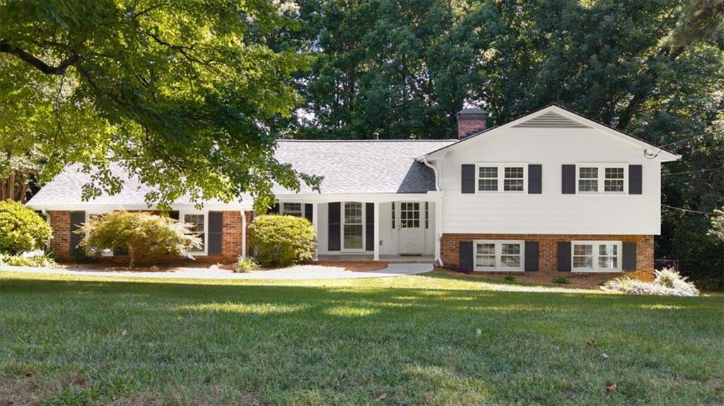 Welcome to your new home, perfectly situated on a quiet street with minimal through-traffic,
offering a sense of serenity without sacrificing convenience. This peaceful enclave is ideal for
evening strolls, thanks to its sidewalks and streetlamps, and is just minutes from schools, parks,
shopping, and dining. Quick access to major highways ensures an easy commute to downtown
Atlanta and surrounding areas.
Inside, the home offers five spacious bedrooms, providing versatility for families of all sizes or
those in need of a home office or guest accommodations. Newly refinished rich hardwood floors
run throughout the first 2 levels and are complemented by freshly painted walls in a calming,
neutral palette.
The heart of the home is the thoughtfully designed kitchen, featuring granite countertops, a
custom tile backsplash, ample cabinetry, and a pantry for additional storage. Stainless steel
appliances—including a refrigerator, cooktop, double oven, built-in microwave, and
dishwasher—make meal prep efficient and enjoyable.
Three full bathrooms have been updated with sleek quartz vanity countertops and new faucets.
Newly installed custom closets help keep everything organized and within easy reach.
The lower level includes newly installed carpet, a family room with a gas fireplace, two
additional bedrooms or flex rooms, a full bath, and a laundry room, providing added comfort and
functionality for everyday living or hosting guests.
Step outside to a backyard oasis. Beyond the patio lies a large, level lawn surrounded by
mature landscaping—perfect for kids, pets, or relaxing in your private green space. An elevated
deck makes it a perfect spot for entertaining, sunbathing, or sipping your morning coffee while
enjoying the peaceful sounds of nature.
