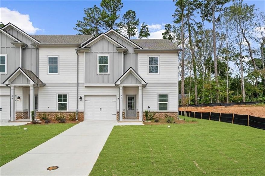 $10,000 BUYER INCENTIVE with preferred lender. New Construction townhomes in The Village at Maple Street in downtown Dawsonville - MOVE IN NOW! the Townsend plan built by EMC Homes GA offers first floor living with zero-step entries. This 3 bed/ 2.5 bath features PRIMARY ON MAIN with walk in shower and walk in closet, beautiful open kitchen with white cabinets, tile backsplash and upgraded countertops - large island with pendant lights overlooks family room. Enjoy your large backyard from your serene COVERED PORCH! Downstairs also includes lovely entrance foyer, OFFICE, half bath and 7" laminates in main living area! Upstairs are 2 large bedrooms that share a full bath and large, open bonus LOFT area! The Village at Maple Street offers open concept floor plans offering aging in place-friendly features like lawn care and exterior maintenance-all handled for you! This is low maintenance living at its best - with no age restrictions! The Village at Maple Street is conveniently located in downtown Dawsonville near the North Georgia mountains, parks, and just minutes from Rt 400 and the North Georgia Premium outlet mall, shopping, dining, mountain wineries and Lake Lanier!
