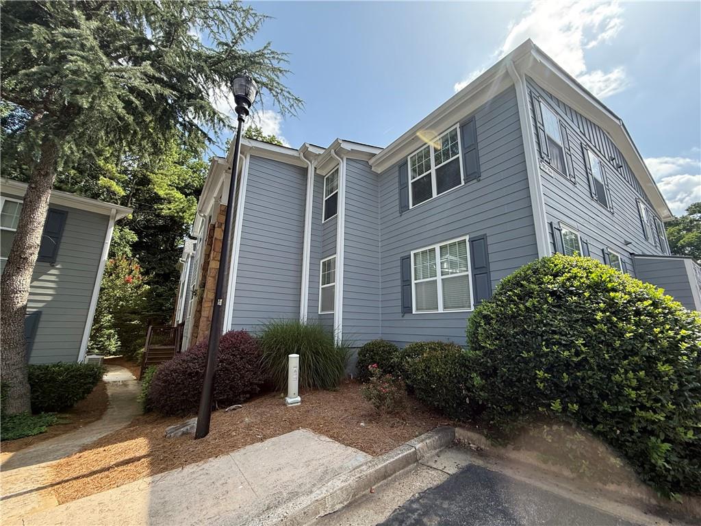 Move in ready top- level three bedroom condo in the desirable Madison at Village Green! Hardwood throughout living room, hall way and dinning area. All new carpet and fresh paint! Open floor plan in the living area, Master bedroom has vaulted ceiling, large walk-in closet and shower and tub combo in the master bedroom. Covered porch perfect for relaxation or additional storage. Priced to sell!!! This won't last long. Community has amenities including a community pool.