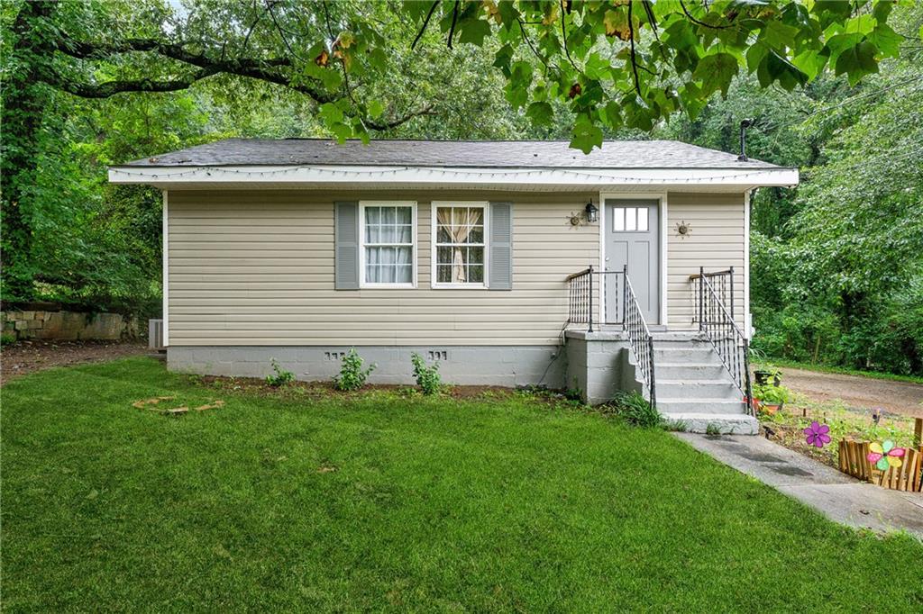 Quaint 3 bed 1 bath starter home priced to sell! Location is easy access to shopping, dining and entertainment and medical. Hardwood floors hidden under the LVT in home, imagine bringing those back to life on a weekend project. New roof, New AC tenants currently occupy home and have kept it nice and tidy! SHOWING ONLY FRIDAYS 11a - 4p. APPOINTMENTS ONLY.