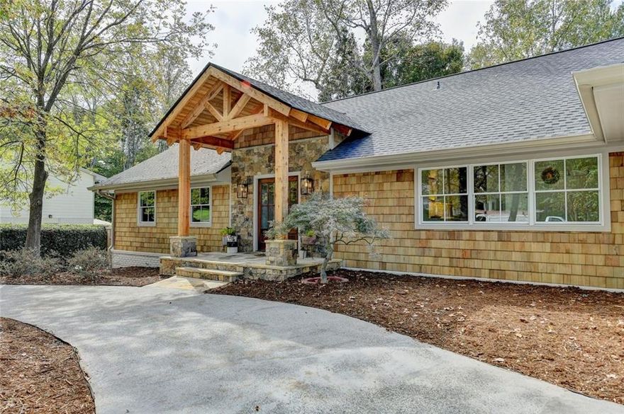 New Build 2025 - Completely reimagined from the studs of a 1971 home.  Relax on 6-acre lot- private lake dock. Designed by Architect with combined skills of structural engineer.  Quality construction with attention to detail. Created for a rare one level living if desired.  Oversize master on main- enjoy coffee on screen porch overlooking Kinglsey Lake. Second master/bedroom option on main.  Upper level 2 bedrooms for office or quests - full bath and storage. Open floor plan includes vaulted ceilings. Finished terrace level perfect in-law, au-pair or student suite. Stubbed for second kitchen. Separate entrance. Wrap around decks. Nature lovers' and gardener's paradise. Canoe over to renovated Kingsley swim/tennis club. Firepit -Interior boosts high end appliances- Chef's kitchen - 5" oak hardwoods throughout. River Stone fireplace - All permitted and approved. Surveyed. Developed with vision for strong buyer. All this plus on a quiet cul-de-sac and friendly walkable neighborhood. Hard to find and won't last. Use showing time - Seller is listing agent.