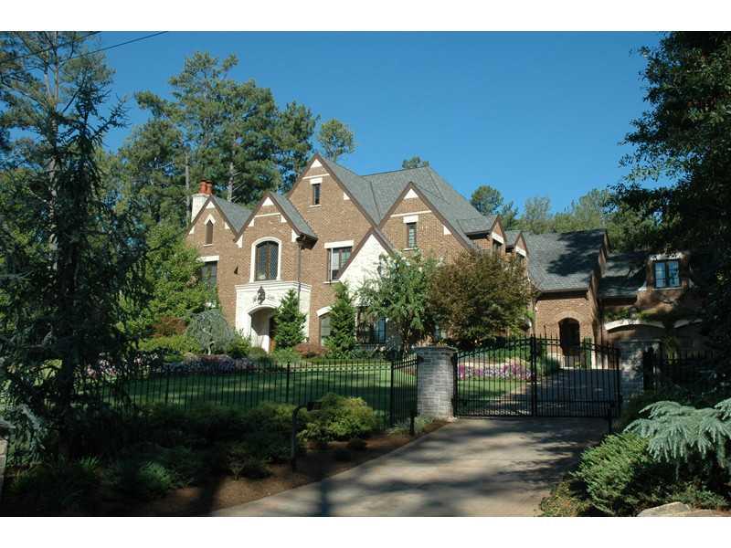 Absolute perfection on just under 2 gorgeous private acres.Custom built w/beautiful detail&every amenity imaginable.Home is perfection11 ft ceilings on main,Master on main,opens to covered porch overlooking incredible back yard which includes lagoon pool,putting green,&sport court.Wonderful livable floor plan w/open stair down to phenomenal terrace level w/600 bottle wine cellar,billiard room,media room,spa/gym.Cabinetry throughout by Design Galleria,custom walnut doors&floors,4 car garage,whole house generator,well for irrigation,Crestron Home control system.Much more!