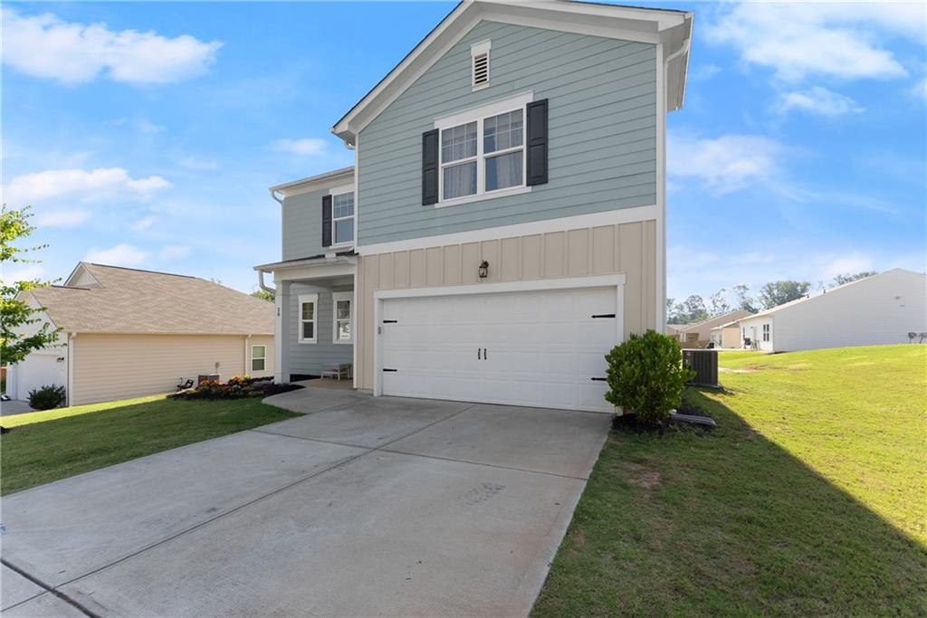 Welcome to **28 Reeves Court** in Dawsonville, a stylish and modern 4 bedroom, 2.5 bathroom family home built in 2020, perfect for first-time homebuyers! Boasting 1,870 +/- cooled square feet of comfortable living space, this inviting residence features a contemporary open floor plan, durable cement fiber siding, and central heating and AC for year-round comfort. Priced below $400,000 this charming home is just minutes from shopping, parks, and schools, making it the perfect place for your family.