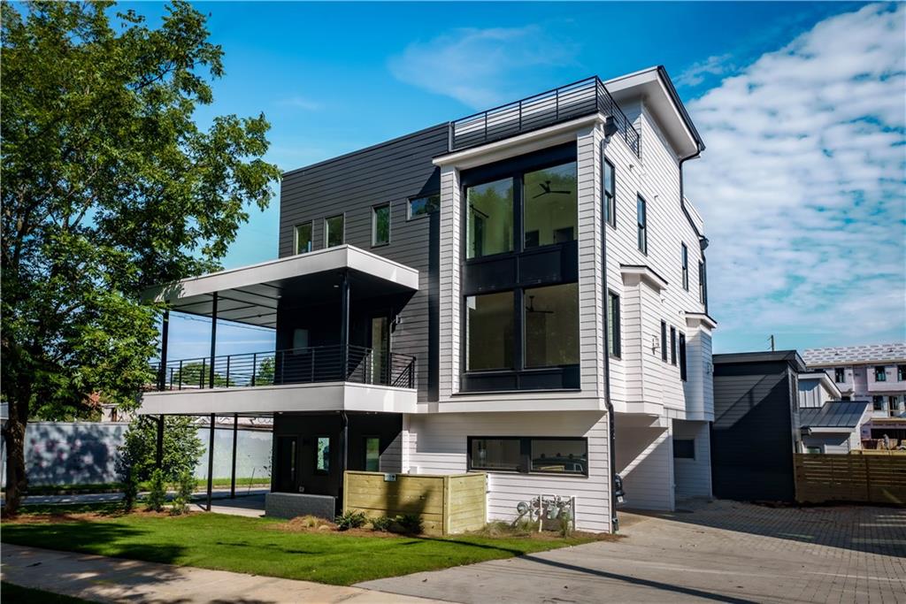 Welcome to SteelSide!
A limited collection of four modern luxury homes perfectly positioned along the Atlanta BeltLine in the heart of Historic Reynoldstown. Just seconds from Madison Yards, Atlanta Dairies, Krog Street Market, Lang Carson Park, Reynoldstown MARTA Station, and more—this residence offers an unparalleled intown lifestyle.
This stunning home features 3 spacious bedrooms, 3.5 designer baths, a 2-car carport, and a private rooftop deck with sweeping skyline views—ideal for entertaining or relaxing under the stars.
The open-concept main level is anchored by a chef’s kitchen with stainless steel appliances, quartz countertops, custom fixtures, and abundant natural light. The primary suite boasts a spa-inspired bath with a custom-tiled shower, dual vanities, and a walk-in closet. Each additional bedroom offers its own full en-suite bath, ensuring comfort and privacy for all.
With sleek, high-end finishes throughout and direct access to Atlanta’s most vibrant neighborhoods—this is modern BeltLine living at its finest.
Live brilliantly intown!