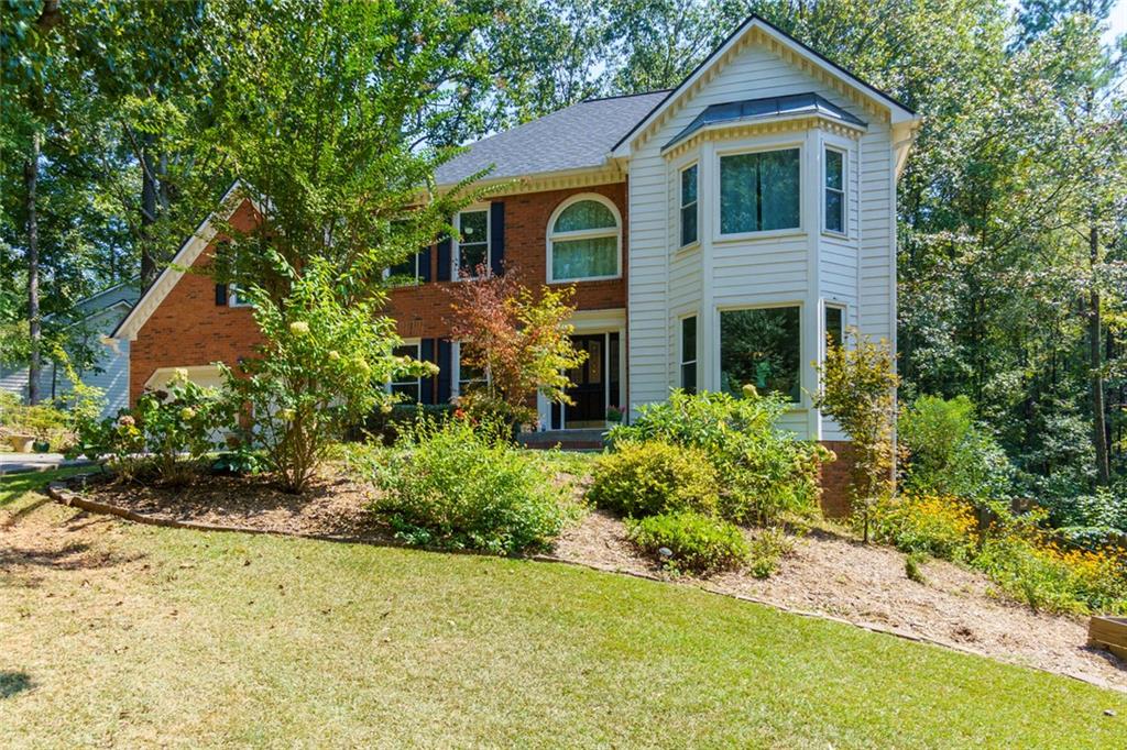 Welcome home! 2206 Heritgae Trace Drive is a beautifully maintained home that’s been freshly painted and is completely move-in ready! Located in the coveted Timber Ridge/Dodgen/Walton school district, this home sits on nearly an acre of lush, landscaped grounds in a peaceful, nature-filled setting.
Step inside to a sun-filled interior featuring hardwood floors, a spacious living room with a cozy fireplace and wet bar, and an updated kitchen with stainless steel appliances, butcher block counters, and a walk-in pantry. The oversized primary suite offers a private sitting area, walk-in closet, and a spa-like bath for the perfect retreat.
Relax year-round on the screened-in porch, overlooking a private wooded backyard with tranquil creek views and daily deer sightings—a true nature lover’s dream! The fenced yard provides both privacy and functionality.
This East Cobb gem combines comfort, style, and an unbeatable location. Seller is offering $10,000 toward closing costs with an acceptable offer—don’t miss this incredible opportunity!