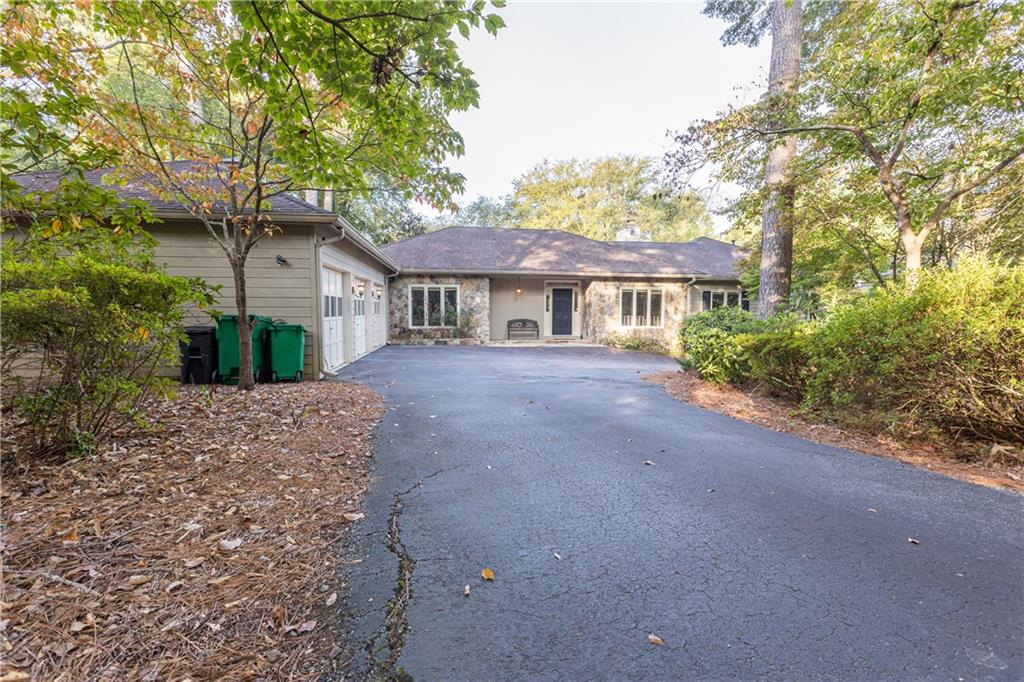 Hidden Gem! Beautiful 3bdrm/3.5 ba ranch located in Brookhaven. Open floor plan throughout, spacious master retreat with walk-in closets, sprawling great room, separate dining room seats 12+, large open concept kitchen perfect for entertaining, oversized back deck overlooking "Nancy Creek" great for grilling or just soaking in nature. 3 Car attached garage, plenty of storage, Newer mechanical systems throughout, W/D not included. Perfect location to great schools, Buckhead, interstates, shopping and restaurants. Landscape included, basement not included.