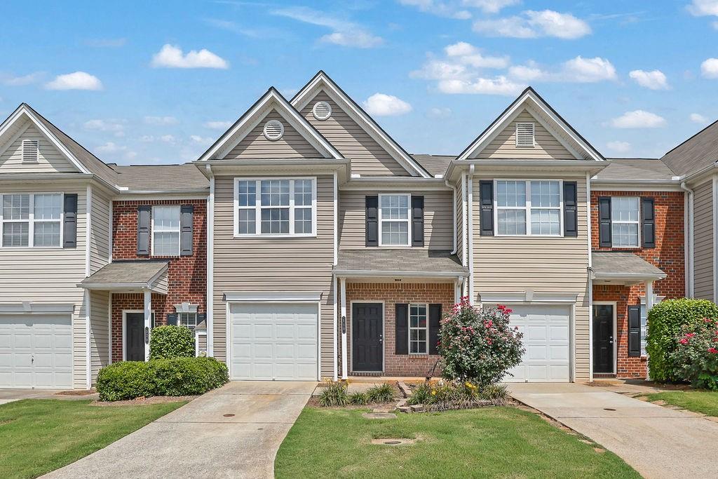 Gated Community with brand new hardwoods on both levels , fresh paint and granite countertops . Community features pool, basketball courts, and playground. Bedrooms and 2.5 Bathrooms. Welcome to this charming Gated Community. Spacious townhouse located in the neighborhood of Wyngate., 3-bedroom, 2.5 bath home offers the perfect blend of comfort and convenience. Inviting interior complete with all new flooring, new paint, home features No Carpet. Large windows that lets in lots of natural light brightening up your living spaces. Family room with Fireplace, Large Owners Suite with private bath, Bright and Open Kitchen with granite counter tops and stainless steel appliances. Live in a home you love and a community you'll adore. Close to Northside hospital