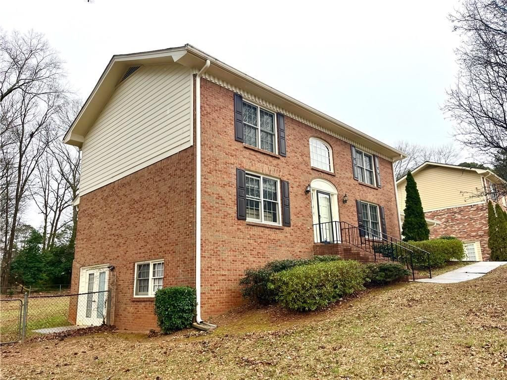 Photo of 1176 Spring Mill Drive SW, Lilburn, GA 30047 (MLS # 7703208)