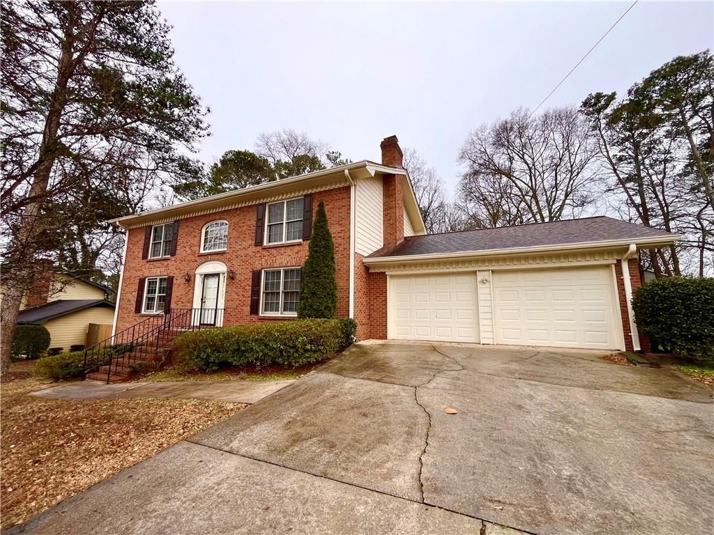 Photo of 1176 Spring Mill Drive SW, Lilburn, GA 30047 (MLS # 7703208)