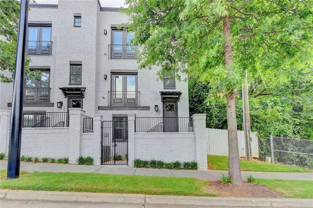 Stunning Townhome in Buckhead - Your Perfect Rental Awaits! Discover this beautifully maintained end-unit 3-bedroom, 3.5-bath townhome in the desirable Brownstones at Cosmopolitan. Enjoy the spacious elegant living room, stainless steel appliances with gas cooking range that does vent outside, beautiful quartz island and countertops, real wide plank hardwood flooring, washer and dryer, and a secure 2-car garage with electric car charging outlet. Each upstairs bedroom boasts a private full bathroom, with a convenient half bath on the main floor. Room off the garage perfect for a office space with its own full bath. You also have access to the condominium amenities next door featuring a huge party room with bar, 24/7 state of the art gym, private theater, game room, billiard table, poker table, and pool with grilling stations. Water, sewer, trash removal and high-speed 1 gig internet included.