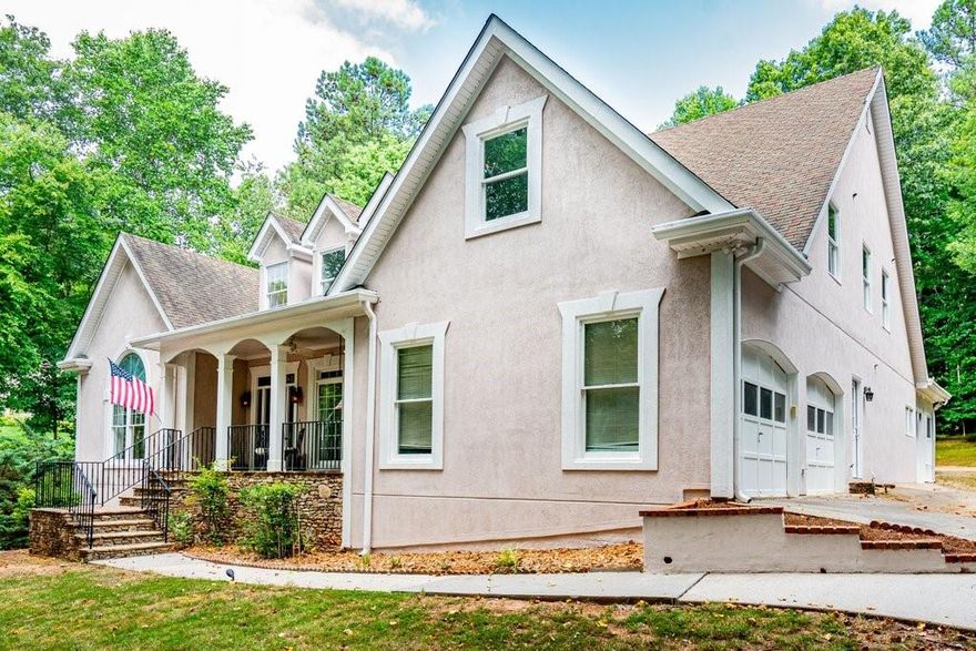 Expect value and security in your dream home. Welcome to this inviting cottage-style home with interiors that unfold into surprisingly generous spaces, blending cozy charm with unexpected room to live, work, and entertain. New roof, siding bonded and secured by a professional company that transfers to you, and a long list of cosmetic updates that make this house feel like your dream home. First, you are going to love the privacy and how the house sits on the mini cul-de-sac, set back from the street towards the rear of this enclave of 24 homes, nowhere within a major road. As you pull in, you'll have plenty of room for parking between 2 garages on the main level, boat door for your boat, project car, or riding equipment on the terrace level, and additional parking pads outside the delivery door off the kitchen. For entertaining you have a three seasons room off the massive kitchen which includes a keeping area perfect for reading and early morning quiet time, adorned by a shiplap fireplace and rustic mantle for setting the easy going tone. During the warmer months, you and guests will make amazing memories in the fenced, level, grassy backyard, with immediate access to your large pool with diving board. There’s room for chairs and tables, and the pool doesn’t feel crowded. Inside the house, during your day to day living, you'll enjoy your gracious master suite on main with vaulted ceiling, dressing room, large bath area, linen closet, and secondary walk-in closet. Formal living room can be used as your office or additional entertaining space, and the grandiose family room with a stack stone fire place suggests a cathedral feeling with the floor set lower that the adjoining rooms. The dining room easily seats 12, if not more, and laundry is located near the garage off the kitchen, with its own sink, because you'll probably get your own garden going in the spring, just outside at the end of the driveway. Upstairs features more rooms that you can count. Don't be surprised if you have to walk through it twice to get all the rooms straight in your head, as they are very spacious and have incredible amounts of storage, unlike anything you may have seen before. One bedroom has its own private bath and the other has a jack and jill bath. The bedroom at the end of the hallway on the Eastern end of the house has a bonus playroom over the garage, perfect for privacy or play, such that it has the effect of being its own wing. Once you make your way to your entertainer's terrace level, you'll have the option for a billiard room or secondary living area. Depending on your needs, this versatile space offers the opportunity for renting out, creating a room for video blog or content creation, space for a secondary office or craft and activity room, and it's own refrigerator, stove with exterior vented hood, and bar sink for a mini kitchen, additional storage rooms, and full bathroom. Finally, just relaxing outside will be pleasant since the private backyard backs up to an estate lot, and just over .7 acre lot makes sure no one is right on top of you. Top rated Cobb Schools and highly rated private and charter schools nearby provide additional value. Finally, don't forget to check out nearby Oregon Park, Kennesaw Mtn Park, and Lost Mtn Park for more fun and activities with your guests. Convenient to area shopping and dining.