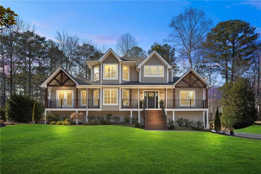PRICE IMPROVEMENT -Walk to the closing table with INSTANT EQUITY at this new price!! Welcome to 3051 Maple Ln.., where timeless elegance meets modern luxury in the heart of Alpharetta.  This extraordinary home has been meticulously redesigned and rebuilt from the ground up, with a complete renovation finished in 2022. Situated on nearly half an acre and within walking distance to downtown Alpharetta, this residence offers the perfect combination of sophistication, comfort, and convenience.  As you step inside, you're greeted by a stunning open floor plan with engineered hardwood floors throughout, custom cabinetry, and exquisite finishes at every turn. The heart of the home is the chef's kitchen, featuring Jenn Air appliances, a built-in refrigerator, a custom butler pantry, and sleek countertops, making it ideal for entertaining and everyday living.  The home boasts 4 spacious bedrooms and 5.5 luxurious bathrooms, including a main-level primary suite that feels like a private retreat. With direct access to the wraparound patio and backyard, this suite offers a custom spa-like bathroom and a designer walk-in closet. Upstairs, you'll find the original master suite with a fully remodeled en-suite, a secondary bedroom, and a loft space perfect for relaxing or working from home.  The finished basement is equally impressive, currently designed as a wellness space with 3 separate rooms, a kitchenette, a second laundry room, and a large sitting area. A curved wall leads to a private outdoor entrance, offering endless possibilities for use.  Step outside into your personal oasis, complete with a saltwater pool, custom fire pit seating, turf lawn, and iron fencing. The fully fenced backyard also features a dedicated turf area for pets, along with professional landscaping and outdoor lighting that create a serene and inviting atmosphere.  Additional features include a 3-car garage, gas lanterns on the front porch, plantation shutters throughout, a tankless water heater, foam insulation, a $5K water filtration system, a state-of-the-art security system, and much more.  This home is truly one of a kind, offering luxury living with no HOA and an unbeatable location just steps from all that downtown Alpharetta has to offer. Don't miss the opportunity to call 3051 Maple Ln. your forever home. Schedule your private tour today and experience the epitome of modern luxury!