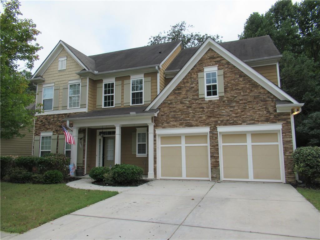 THIS BEAUTIFUL 2 STORY CRAFTSMAN STYLE HOME HAS 3 BED AND 2.5 BATH. HARDWOOD FLOORS, LARGE OPEN EAT IN KITCHEN WITH TILE BACK SPLASH AND ISLAND OPENS TO YOUR FAMILY ROOM WITH FIREPLACE. LIVING & DINING ROOM WHICH FEATURES CHAIR RAIL SHADOWBOX AND CROWN MOLDING. OVERSIZED MASTER WITH A DOUBLE VANITY, PRIVATE WOODED FENCED BACKYARD. NEW CARPET ON MAIN AND TOUCH UP PAINT. QUIET NEIGHBOORHOOD. 5MIN DISTANCE TO MALL OF GA. EASY AND CONVENIENT ACCESS TO SHOP, RESTAURANT, PARK, AND I-85 AND 316.