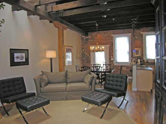 GORGEOUS TOP FLR AUTHENTIC LOFT W/CEILING HEIGHTS UP TO 16FT W/WOODED BEAMS & SKYLIGHTS*EXPOSED BRICK*HDWD & TILE FLRS*S/S APPLS*CORIAN C'TOPS*FIREPLACE*GATED*ROOFTOP DECK*CASTLEBERRY, WALK TO SHOPS, DINING & GALLERIES*