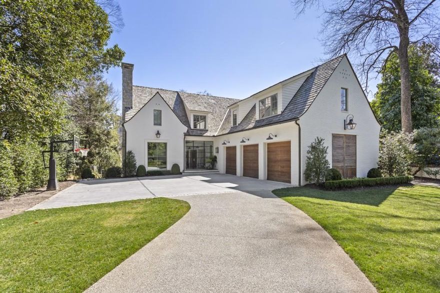 Incredible custom home located on one of Buckhead's most sought-after streets/neighborhoods where No detail has been overlooked. Herringbone patterned oak floors, reclaimed wood beams, oversized iron windows and custom lighting are among the numerous unique touches contributing to the comfortably elegant ambiance. The open main level has an airy and inviting flow centered around the spectacular kitchen boasting an oversized island clad in Vermont white marble, ceiling-height bespoke cabinetry, premium Wolf and Sub-Zero appliances, floor-to-ceiling subway tile, plus a separate butler's pantry and wet bar. Spacious primary suite is anchored by a dramatic wall of iron windows, vaulted ceiling, and sumptuous bath with dual floating vanities, upgraded walk-in shower and separate soaking tub. The expertly finished terrace level offers additional living space with a media room,game room, massive bar with temperature-controlled wine storage, exercise room and private guest suite. Outdoor entertaining takes top priority with a fireside covered patio overlooking the stunning saltwater pool, stone sun deck and turfed backyard.