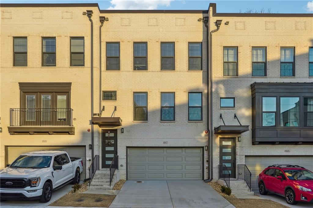 Discover modern elegance in this beautifully designed townhouse, featuring a bright, open floor plan perfect for entertaining. Tenant only pays for electric, gas and water is taken care of by the owner. The main level boasts gleaming hardwood floors throughout, a chef-inspired enormous kitchen island with quartz countertops, stainless steel appliances, and a seamless flow to the living area. Step outside to your spacious back deck—ideal for relaxing or hosting gatherings. Upstairs, you'll find three bedrooms, including a luxurious primary suite with a spa-like bathroom, complete with a large walk-in shower and an oversized walk-in closet. The upper level also features a secondary bathroom, perfect for the additional bedrooms. The lower level offers a versatile bonus room with a full bathroom and access to a charming back patio, perfect for enjoying outdoor space. The level also provides direct access to the 2-car garage. Nestled in the amazing Easton community, this home is conveniently located near shopping, dining, and top-notch amenities.