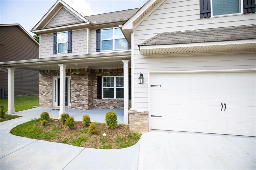 Gorgeous 2 Story, 4 bedroom, 2.5 baths, Craftsman style home. Welcoming you with a spacious front porch, the home enters into an open concept floor plan with hardwood floors through the Foyer, leading to the Great Room, separate Dining Room, Breakfast area & Kitchen with custom cabinets, stainless steel appliances, granite countertops & a huge island sure to please the chef in the house. The second story boasts 4 bedrooms with vaulted ceilings, including an Oversized Owner's Suite with sitting area, walk-in closet, large master bath with double vanities, standing shower and spa-like tub. Covered patio and spacious backyard perfect for outdoor living space and entertaining guests. Washer & dryer included. Home may also come furnished. Credit and background check required. Contact for showing today!