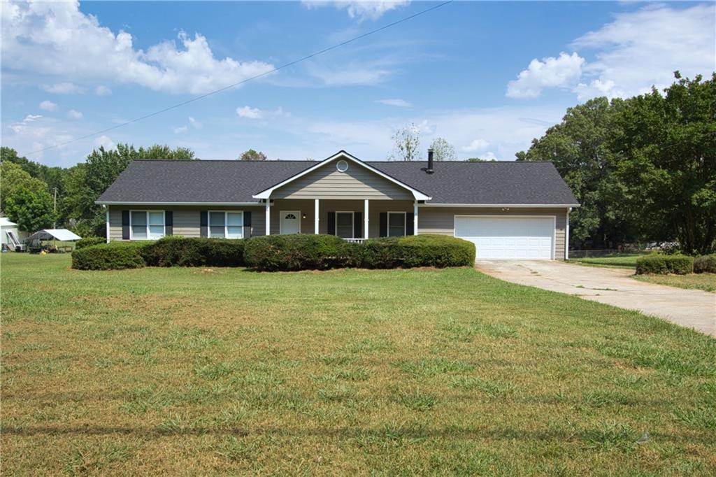 AVAILABLE NOW!! Stunning 3 bedroom, 2.5 bathroom ranch with rocking chair style front porch, oversized deck that opens into a fenced in yard. Spacious living room with fireplace, trey ceilings and built-in bookcase. Kitchen features white cabinets, stainless appliances, refrigerator will be installed at move-in, farmhouse shelves and eat-in kitchen. Half-bath sits right off the kitchen with an attached laundry room. Primary bedrooms has trey ceiling, walk-in closet, and en-suite bathroom with separate shower. (Applicant's total household income must be at least 3 times the monthly rental amount. Applicants must have no prior evictions, have a good credit score, and excellent past rental history. Renters Insurance is required. No pets or Housing Choice vouchers. Please note, our homes are available on a first-come, first-serve basis and are not reserved until the lease is signed by all applicants and security deposits are collected. This is a NON Smoking Property