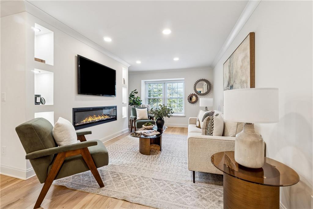 Rare, rare, fully renovated luxury condo living opportunity in the gated and private Cross Creek subdivision. This top-floor unit blends timeless elegance with modern upgrades. Renovated with brand-new hardwood floors, gold hardware, and custom lighting throughout the entire home. It also features a designer kitchen with custom cabinetry, quartz counters, stainless KitchenAid appliances, and a chic backsplash. The living room features a built-in fireplace wall with illuminated shelving, while the oversized bay windows with deep sills provide charming window seating. The kitchen is positioned to overlook the sunroom, filling the home with natural light and creating a seamless connection between spaces. The oversized bay windows throughout the home add architectural character. The floor plan is both open and spacious, with large bedrooms throughout. The primary suite includes an oversized custom closet with a sitting area, while the secondary bedrooms are also generously sized, offering flexible living. Bathrooms are finished with custom vanities, marble-inspired tile, gold fixtures, and spa-like showers.
Residents enjoy Cross Creek’s resort-style amenities: an 18-hole par-3 golf course, three pools (including saltwater), tennis/pickleball courts, fitness center, clubhouse, café/bar, EV charging, and 24/7 gated security. FHA/VA approved, no rental restrictions.