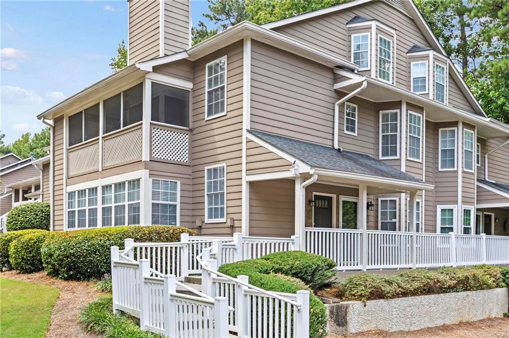 Welcome home! This immaculately maintained 3 bedroom, 3 full bath condo is move-in ready and waiting for you! From the moment you pull into the North Forest community, you will feel the care and pride the residents take in their homes, and 2147 is no exception. The charming front porch welcomes you into the home. Follow the staircase up to the main level, where you are met with an open, airy large great room with vaulted ceiling. Attached to the great room is the dining area, which leads you into the large kitchen with granite countertops, recently updated appliances and TONS of storage! On the other side of the great room is a lovely screened in porch, with extra outdoor storage closet. Back inside, follow the hallway from the great room to a bedroom and full bath with laundry closet, and to the primary suite with en suite bath and walk in closet. On the other end of the home you'll find the staircase leading up to the top level where you'll find the third bedroom, complete with full bath, walk in closet, and a picture window that opens to look into the great room below! With LVP flooring throughout, brand new SW Neutral Ground paint from top to bottom, and a sparkling professional clean, this home is ready for you to move into today!