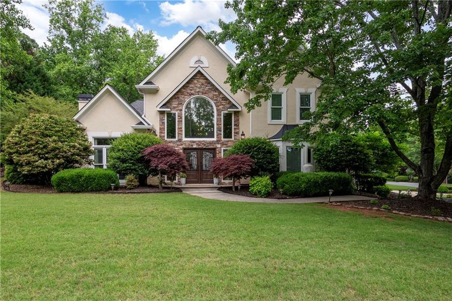 Discover this beautiful home in sought after Hardage Farm subdivision in Marietta, right by Kennesaw National Park. Home is situated on corner lot of quiet cul-de-sac. As you enter through the double mahogany wood/iron doors, you are greeted by grand foyer with soaring ceiling and an abundance of natural light. The main level layout includes Study/Office, Spacious Dining Room, Oversized Great Room with vaulted ceiling and fireplace, and open to the light and bright Gourmet Kitchen with white cabinetry and gorgeous granite counters. First floor living space is an entertainer's dream and personal retreat in one. These light-filled spaces provide stunning views and access to your backyard oasis with sparkling walk-out pool and hot tub that's perfect for entertaining family and friends, or simply relaxing! Upstairs offers an oversized Master Suite with his-n-her closets, plus shoe closets and a totally renovated/updated Master Bath. There are 3 additional Bedrooms and Bath upstairs - great for family and guests, or office/playroom. Conveniently located just minutes to Marietta Square, Kennesaw Mountain, Kennestone Hospital, Mt. Paran Christian School, Marietta Country Club and more!