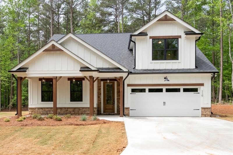 New construction featuring an enclave of eight custom homes on 1 acre lots close to Villa Rica with NO HOA. This cozy home features 3 bedrooms & 2 bathrooms on the main for easy living. Master bathroom boasts double vanity, large shower with modern tile, corner bench and niche. There is also an additional bedroom and bathroom upstairs, perfect for guests or even an office. You will appreciate this Bright, open floorplan with white cabinets, granite countertops, kitchen island, pantry, current lighting and fixtures as well as the rock fireplace. French doors lead out to the covered porch and patio with nice level lot. This home is total electric with gas starter fireplace and option of gas cooking and gas grill connection. Across the street from Union elementary school and convenient to the Roses store and Hwy 120 intersection. (FMLS map is incorrect).