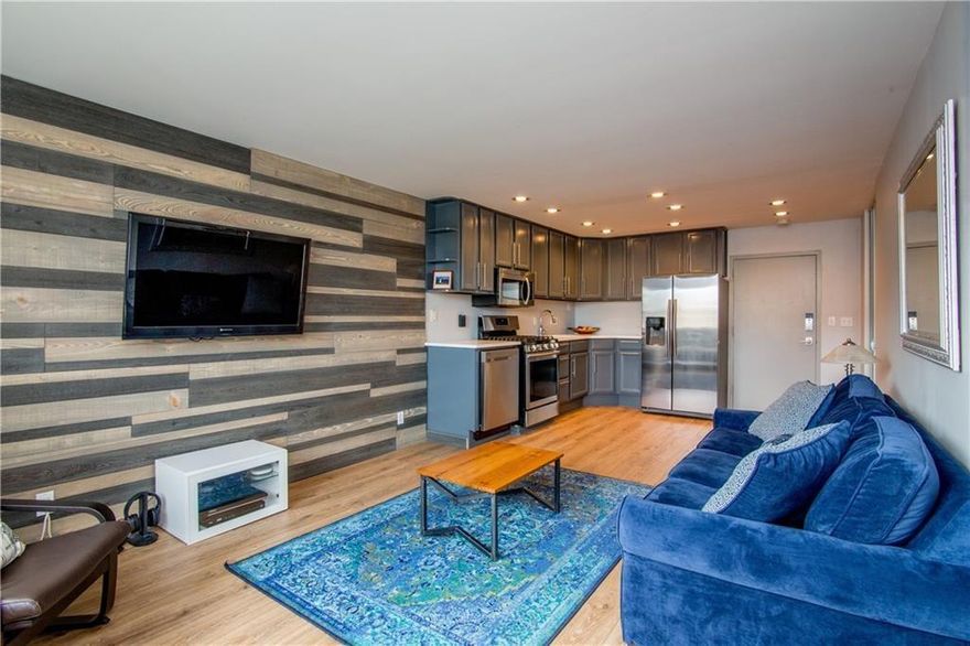 GREAT CASH FLOW, NO RENTAL RESTRICTIONS, SHORT-TERM ALLOWED, renovated one bedroom, one bathroom, living room/kitchen combination, and separate dining room. Fully supplied and stocked. ALL
FURNISHING INCLUDED. New luxury vinyl hardwood floors (AquaGuard/Floor & Decor waterproof flooring), private bedroom with premium
quality hybrid mattress and sleeper sofa, clean white bathroom, rare in-unit high-efficiency washer & dryer, high-speed internet, blackout
blinds & curtains. It is furnished in calming blues, grays, and whites and is stocked to host several people comfortably, and is fully loaded.
It features a queen-bedroom suite with a great view of the city. The living area features a rustic, charming real wood accent wall with an
adjustable wall-mounted flatscreen TV. The kitchen area is fully stocked with quartz countertops, stainless appliances, and cooking & dining
essentials. Building Bylaws allow for any rental lengths and no caps on the number of rentals. Perfect place to invest in a turn-key income generating asset that is already cash-flowing and appreciating at the same time. The Landmark is one of the Downtown Atlanta skyline's
most underrated buildings poised for skyrocketing appreciation. The homeowner association fee includes everything: 300 MB Xfinity
Internet, Electricity, Heating, Cooling, Gas for cooking Range, Water, Sewer, 24-hour Concierge, plus all the HOA Amenities. One assigned
parking space typically $55/night value, onsite 24-hour concierge, small fitness gym, full-size inground pool, and laundry facility available.