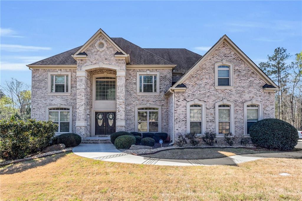 Welcome home to your newly renovated estate! This gorgeous property has it all! From the time you pull up to this wonderful subdivision to the moment of you walking into this grand estate with an amazing beautiful foyer will make you feel right at home! This home was recently renovated and has marble everywhere! All lighting fixtures has been replaced and updated! The natural wood floors has been sanded and stained to give the home a newer richer color. All walls has been painted a beautiful white and gray two tone with high end paint! The kitchen has natural marble countertops and backsplash with new appliances! The carpet in the entire home is brand new! Both huge fireplaces has been renovated with marble tile. The master bath is a dream bath with marble tile throughout with quartz countertops! The huge jacuzzi and shower lights up with led lighting and both can hold at least 4 people or more! The master has an enormous walk in closet! All the bathrooms in each bedroom has been fully renovated with marble throughout the entire bathroom with quartz countertops! Make your way down to this full finished basement which includes a movie theater, beautiful quarts countertops kitchen, two bedrooms, a game room, and a full bathroom with marble tiles throughout the bath! Don’t miss your chance to own this magnificent estate! Won’t last long!