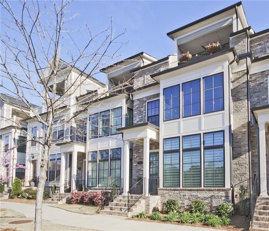 This home is an extraordinary blend of sophistication and location in the sought after community of Foundry. Perfectly situated between Avalon, Downtown Alpharetta and the Alpha Loop, this stunning townhouse offers the luxury you have earned and lifestyle you have only dreamed about until now. There is truly no other home in the community that is more gorgeous than this one. Savor the dramatic feature walls throughout the home that creates extraordinary ambiance around every corner. Enjoy new gorgeous designer lighting in every room, fresh paint in a soft designer neutral palette, new custom closets throughout, new epoxy floors in the garage, and so much more. Your favorite spot in the home might be the covered rooftop terrace where you can relax and entertain with ease. This fabulous space is perfectly situated just steps away from the spectacular bonus entertainment/media area with a wet bar. You can truly have it all! The cherry on top is the elevator that services all four floors. The floorplan features floor to ceiling windows, a modern open floor plan, four bedrooms/flex space and gorgeous hardwood floors throughout. The fabulous kitchen boasts a huge quartz island and top of the line appliances which flows into the dining area with exquisite lighting and feature wall. The sunny breakfast area opens to a second outdoor space, perfect for grilling out of enjoying a glass of wine. Upstairs, the oversized primary suite is well appointed with beautiful lighting and stunning feature wall. No expense was spared making this the most unforgettable unit in all of Foundry. Being steps away from the amenities and the mailbox are two more reasons this home is the perfect choice. Start living your best life now!